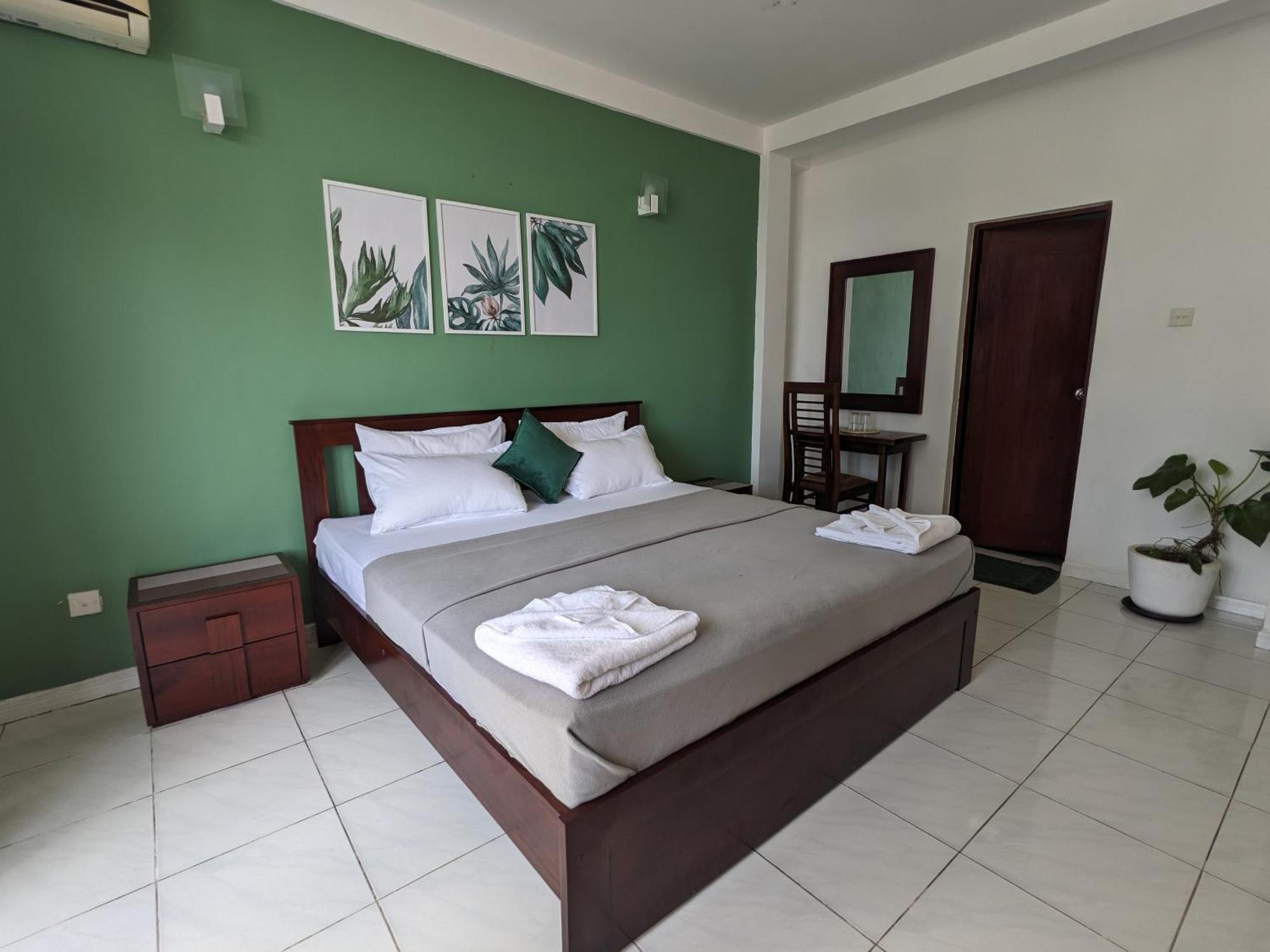 Отель Palmyrah Residencies Коломбо Номер фото